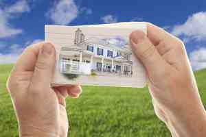 © Andy Dean - Fotolia.com Haus auf Visitenkarte